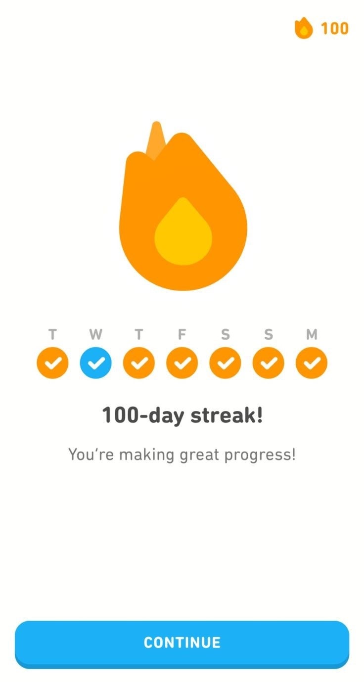 Duolingo page showing a flame, ticked off days of the week, and a message celebrating a 100-day streak