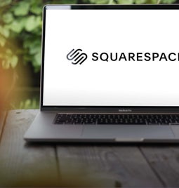 Computer with a Squarespace logo