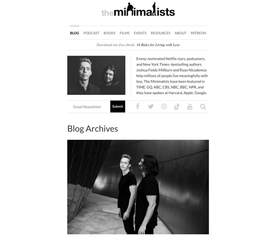 A black and white website for the Minimalists with 2 photos of two white guys - one with short blonde hair, one with long brown hair